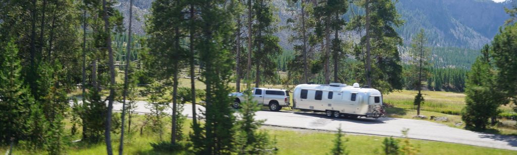 https://rv.solar/wp-content/uploads/2020/01/off-grid-camping-travel-trailer-1024x308.jpg